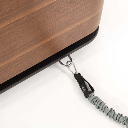 Luxury fitness equipment, details view of the resistance tubes from the Nohrd Stepbox - all in one fitness box made with natural walnut wood.