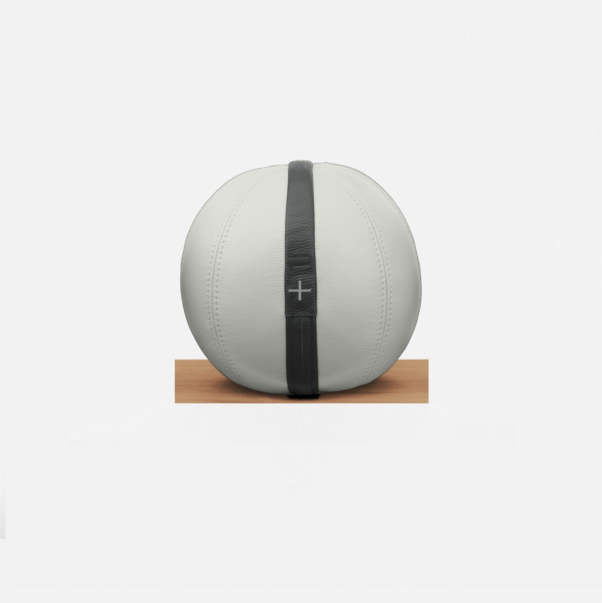 Handcrafted medicine ball with luxurious Italian white base leather and black accent leather. PENT. MOXA - Medicine Ball