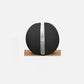 Handcrafted medicine ball with luxurious Italian black base leather and white accent leather. PENT. MOXA - Medicine Ball