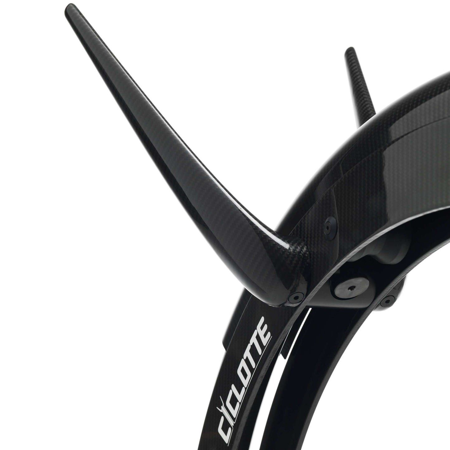 Extremely close up view of a luxury gym equipment, designer exercise bike in black carbon color, handcrafted from Italy. Ciclotte Bike - Designer Exercise Bike