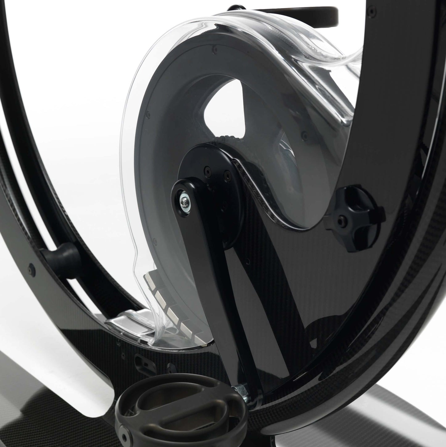 Close up view of a luxury gym equipment, designer exercise bike in black carbon color, handcrafted from Italy. Ciclotte Bike - Designer Exercise Bike
