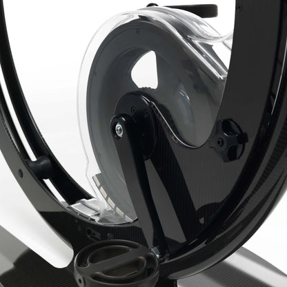 Close up view of a luxury gym equipment, designer exercise bike in black carbon color, handcrafted from Italy. Ciclotte Bike - Designer Exercise Bike
