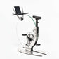 Back view of a luxurious gym equipment, Italian design exercise bike made of crystal glass. Ciclotte Teckell - Glass Exercise Bike
