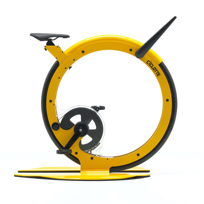 A luxury gym equipment, designer exercise bike in yellow steel color, handcrafted from Italy. Ciclotte Bike - Designer Exercise Bike