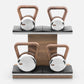 (2) Luxury fitness equipment, luxury kettlebells on horizontal wooden stand, handcrafted with stainless steel, premium Italian leather and natural wood. PENT. LOVA Set - Kettlebells on a Horizontal Stand