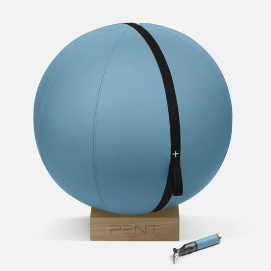 A 65cm Fitness Ball in luxurious leather, by PENT x Cycling Bears, displayed on a compact wooden stand, with a hand held pump available in Singapore.
