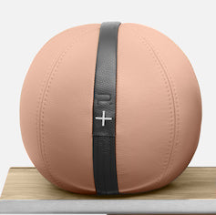 Close up view of the PENT x Cycling Bears moxa leather weighted ball in pink color. Crafted from luxurious natural leather. Best leather medicine ball. Ready Stock.