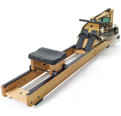 Top view of a luxurious home gym equipment, rowing machine with water resistance, made with high quality wood in oak wood finish. NOHRD Water Rower S4 - Rowing Machine