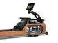 Close up view of a luxury fitness equipment, wooden water rowing machine for full-body workout with the soothing sounds of water. Stil-Fit Flow One - Rowing Machine with water resistance