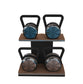 Luxury fitness equipment, 4 luxury kettlebells on horizontal wooden stand, handcrafted with stainless steel, premium Italian leather and natural wood. Custom variation 17. PENT. LOVA Set - Kettlebells on a Horizontal Stand